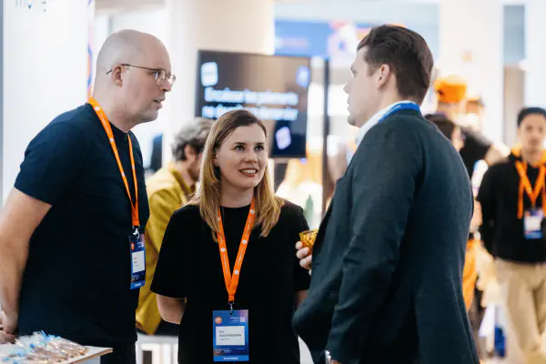 LupaSearch team members networking with partners at an ecommerce industry event